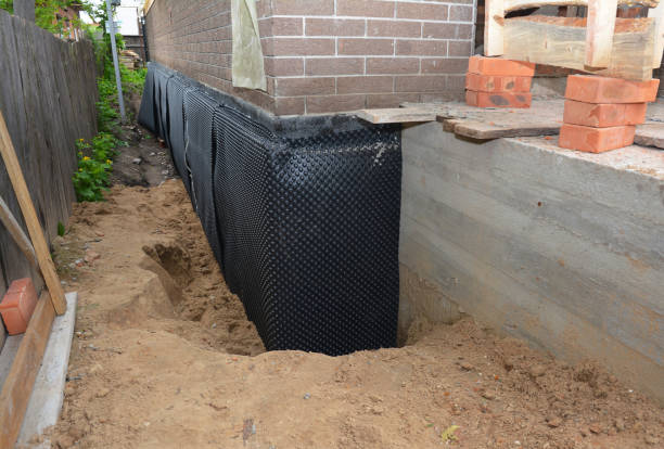 Happy homeowners after waterproofing job in Wilkesville
